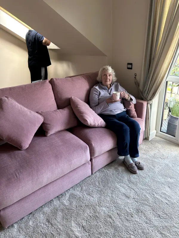 Enjoying my new sofa in my new home
