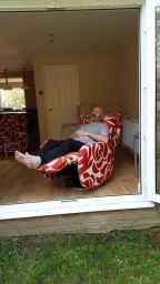 My husband enjoying his new chair