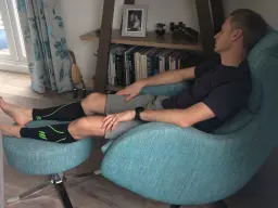 Mr B recovering from marathon training in the Lenny chair